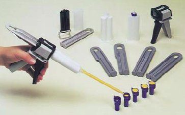 Twin cartridge manual and pneumatic guns